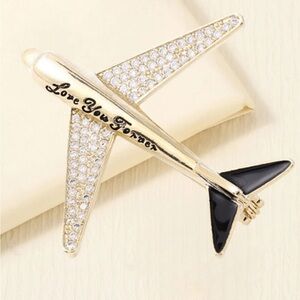 Chic Gold and Black Airplane Brooch
